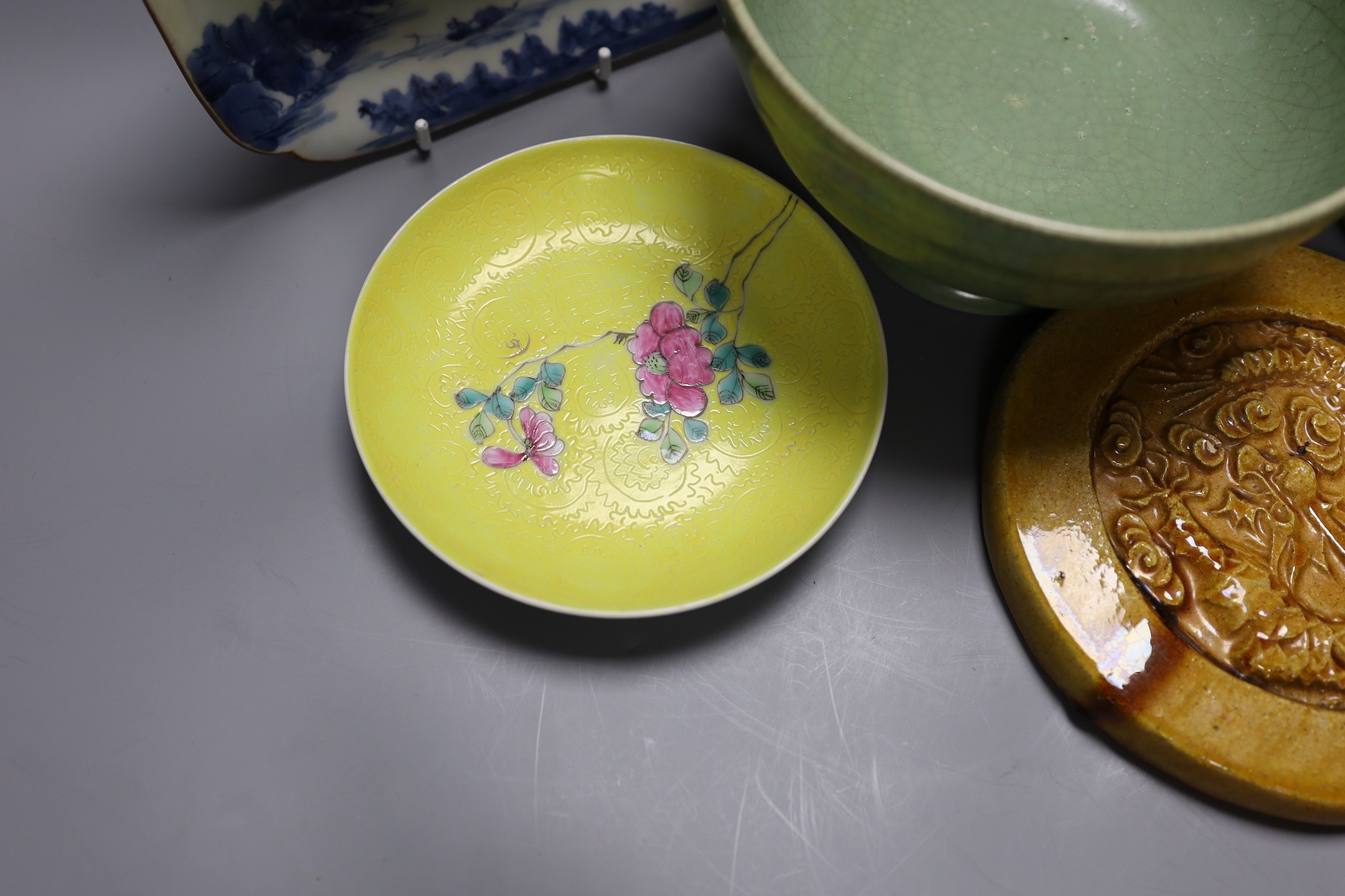 A celadon crackle glaze pedestal bowl, together with a blue and white inscribed dish, a 19th century famille verte dish and others (6)